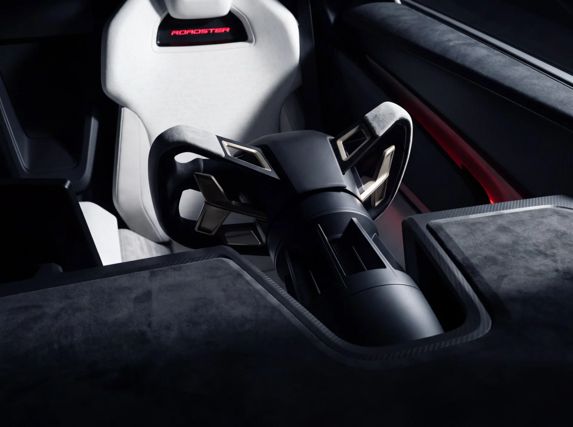 Detalhe do volante tipo manche e dos materiais do interior do novo Tesla Roadster